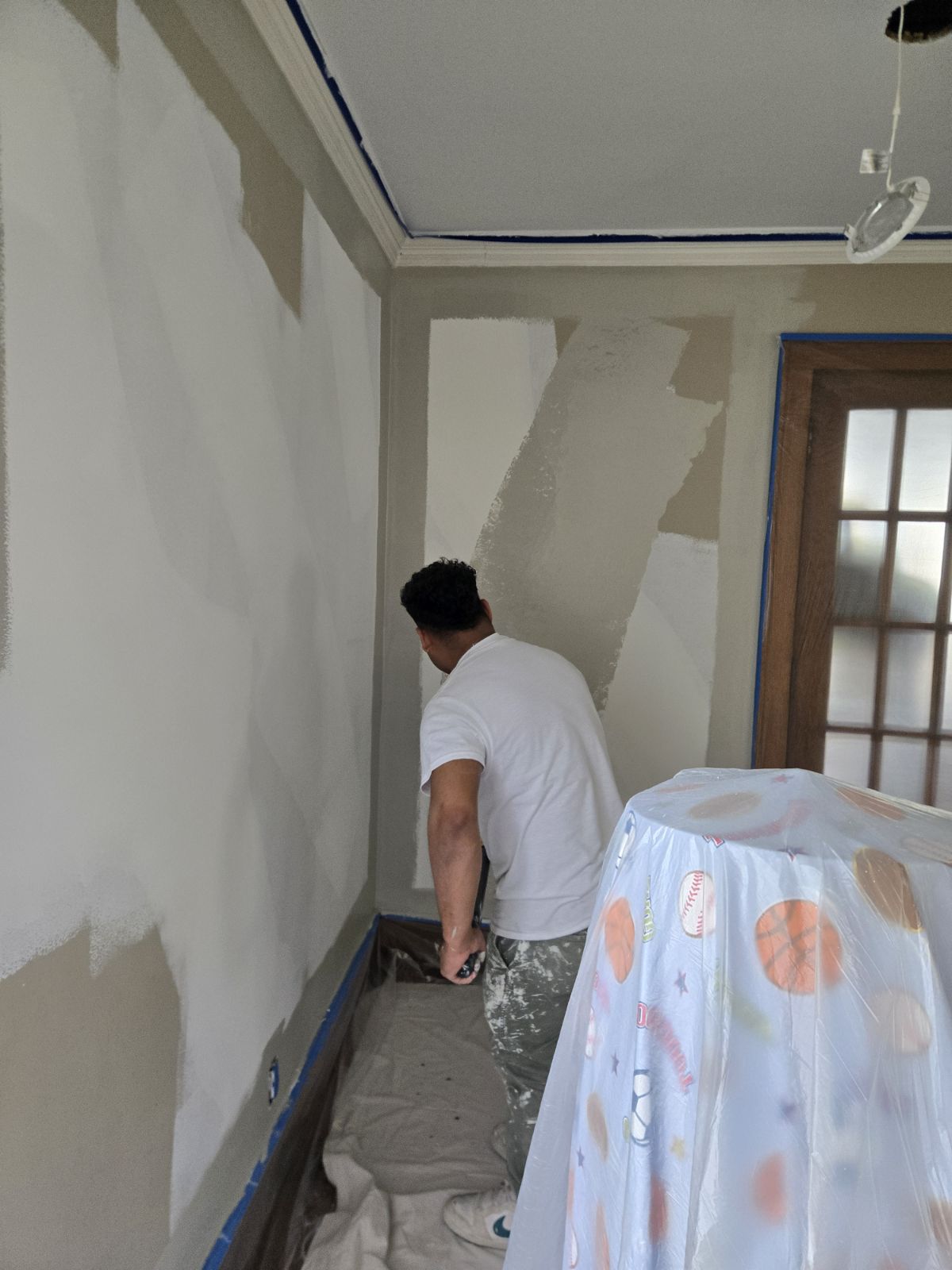 interior house painters applying paint on walls in columbus ohio residential home