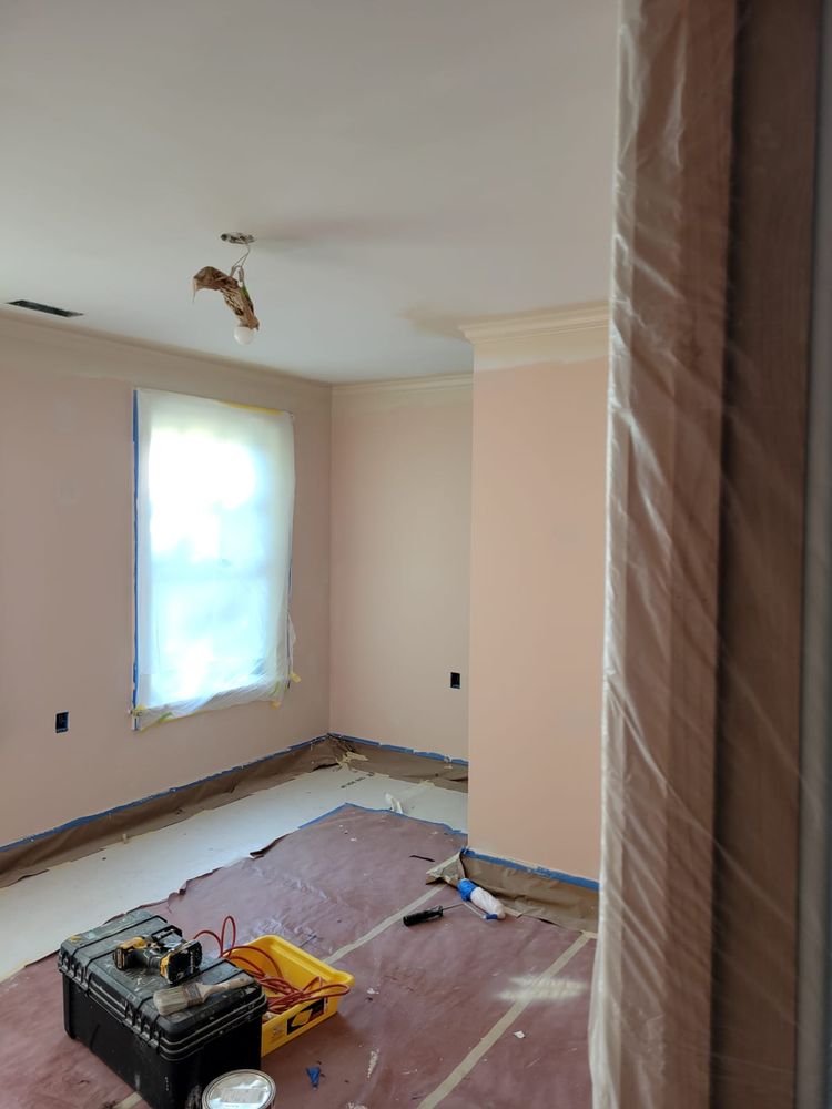 room prepared for residential painting project with covered floors in columbus ohio